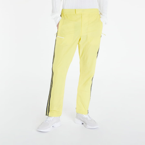 Šusťáky adidas x Pharrell Williams Shell Pants UNISEX Light Yellow