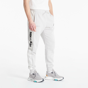Kalhoty Nike Air Brushed Back Joggers šedé